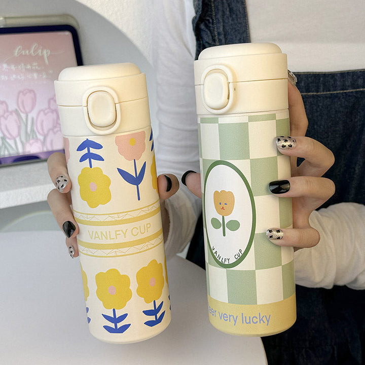 Stilig 500ml isolert drikkeflaske med blomsterdesign, holder drikken kald/varm. Gjenbrukbar rustfritt stål flaske.