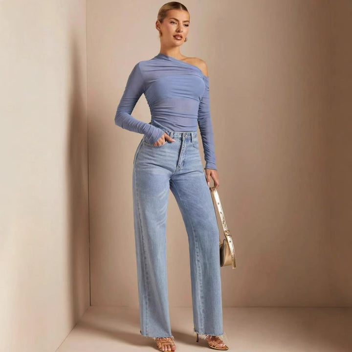 Asymmetrisk dame-bodysuit med stilfulle rynker og lange ermer.