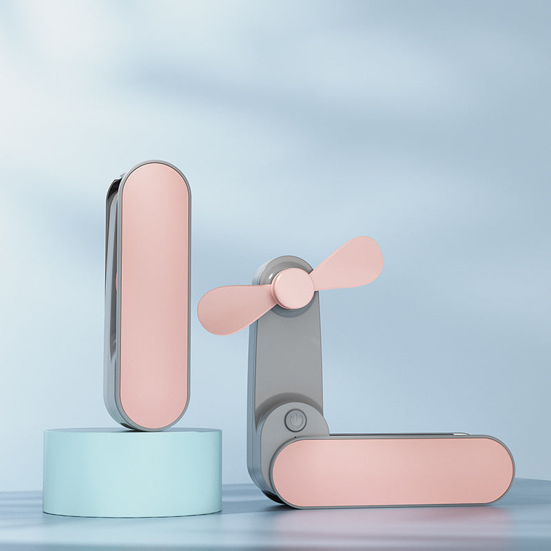 Bærbar, sammenleggbar USB-bordvifte for enkel transport og kjøling på kontoret eller reise. Kompakt design.