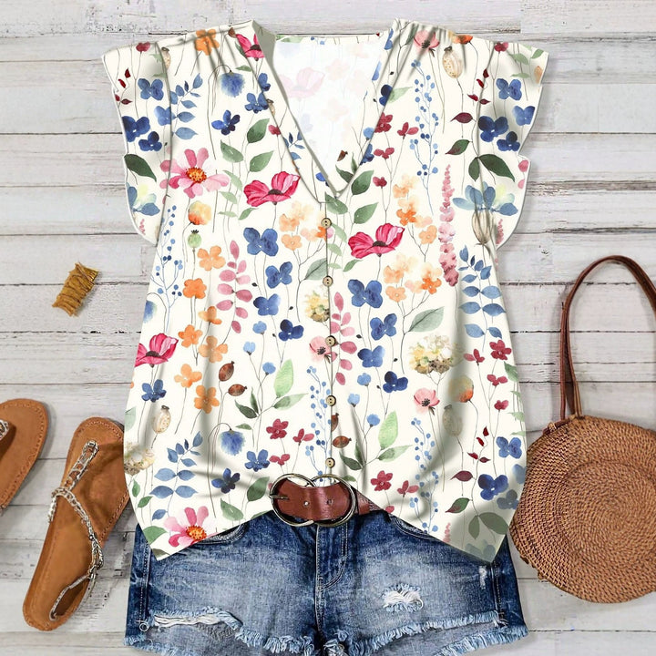 Elegant blomsterbluse med V-hals for kvinner, perfekt for sommerfester og uformelle anledninger.