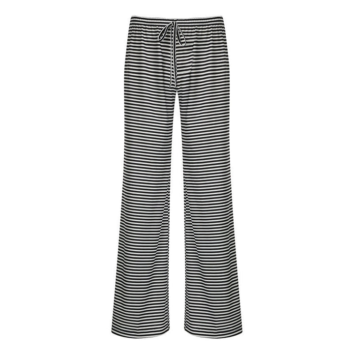 Dame loungebukser, løse med striper og elastisk midje. Komfortable fritidsbukser for avslappet stil.