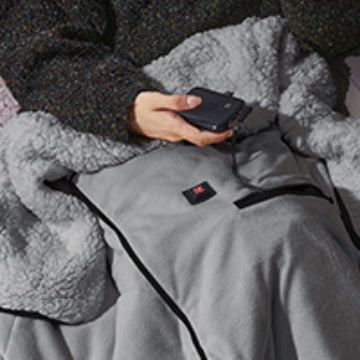 Dame oppvarmet kosepledd i myk fleece for ultimat vintervarme og innekos på sofaen. Perfekt varmeteppe.