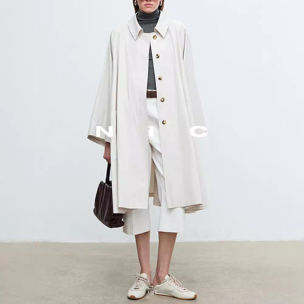 Salvievgrønn avslappet trenchcoat for damer, oversized ermer, elegant yttertøy for vår/høst.
