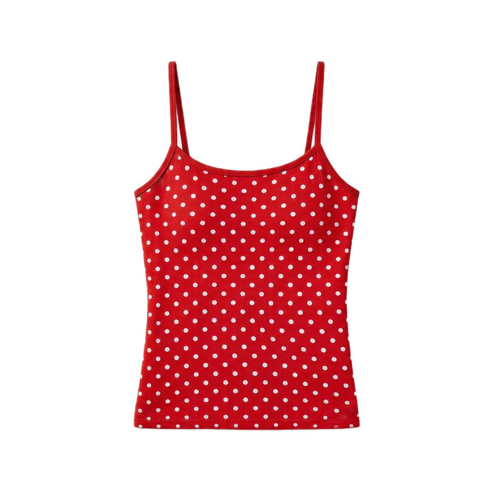 Stilig prikket dame topp med tynne spaghetti stropper. Alltidig sommer topp som er både elegant og komfortabel for kvinne mote.