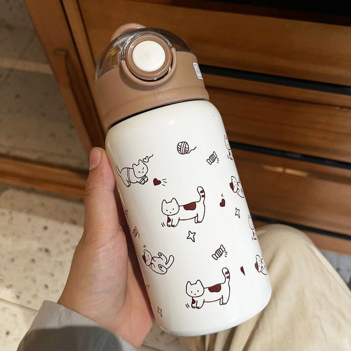 Unisex drikkeflaske med bedårende kattemønster, lekkasjesikker og gjenbrukbar. Stilig tilbehør.