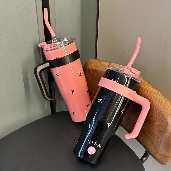 Stilren isolert drikkeflaske 1200ml med bærehåndtak for dame. Holdbar gjenbrukbar vannflaske for aktiv livsstil.