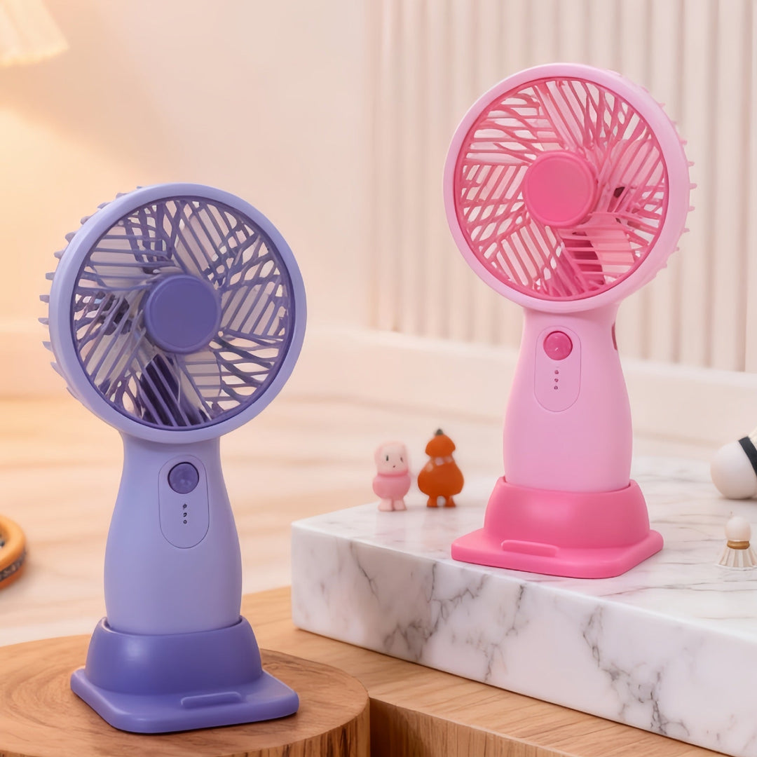 Bærbar USB håndvifte for kvinner, kompakt og rosa, gir kjølig komfort på farten.