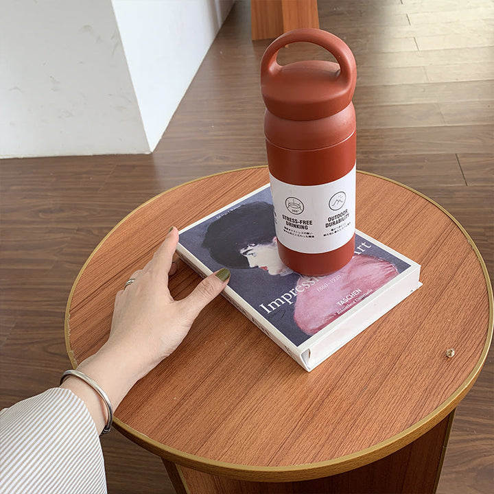 Stilig svart 350ml termos for kvinner, BPA-fri rustfritt stål vannflaske med ergonomisk håndtak for trening og utendørs.