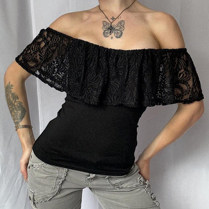 Elegant svart volangtopp for dame, off-shoulder design med blonder. Ideell som festtopp og vårklær.