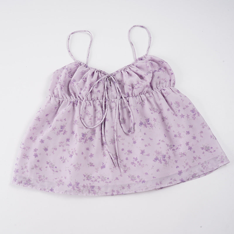 Kvinner's lett blomstret spagettistropptopp i lilla med justerbare stropper, elegant og komfortabel.