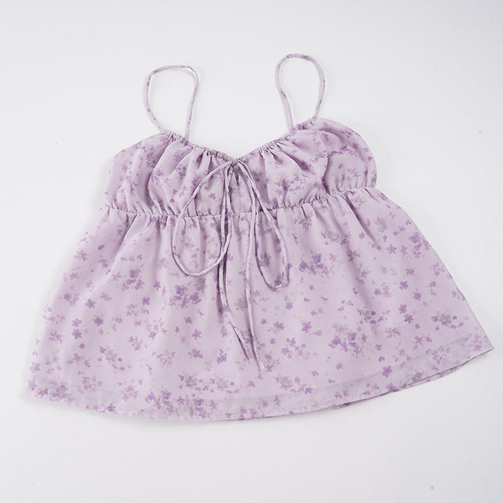 Kvinner's lett blomstret spagettistropptopp i lilla med justerbare stropper, elegant og komfortabel.