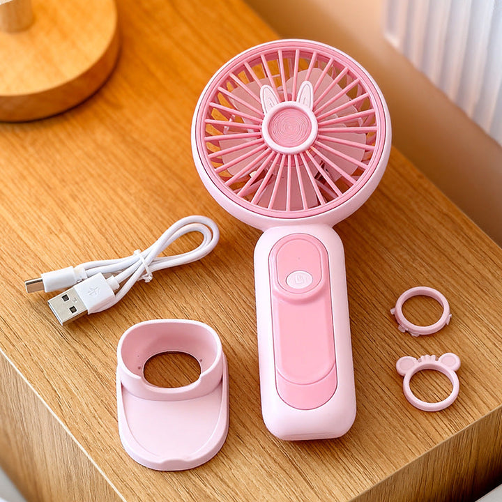 Ergonomisk designet USB-håndvifte med kaninører, gir komfortabel personlig kjøling.