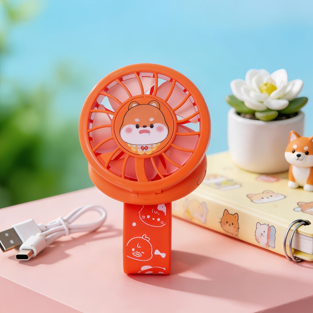 Liten USB håndvifte med et lekent dyremotiv. Perfekt gave for sommeravkjøling, kontor og utendørs.
