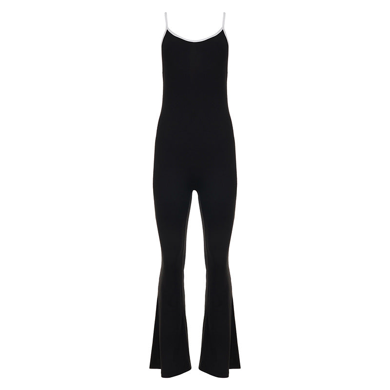 Ekte elegant svart dame jumpsuit med fluffy stoff, vide ben og unik ryggutskjæring for moderne kvinner.