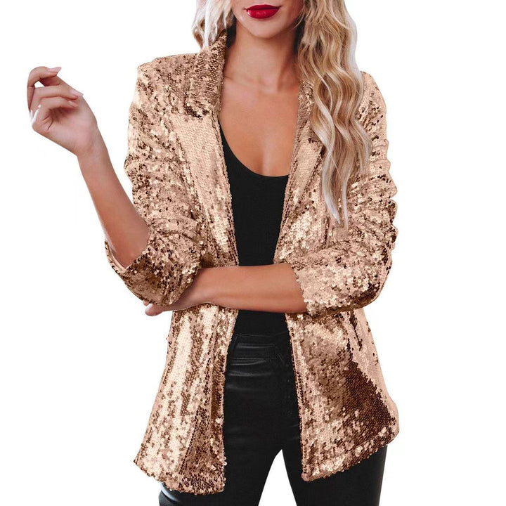 Gullfarget moteriktig paljettblazer for kvinner. Glitrende statementplagg for fest, luksuriøst design.