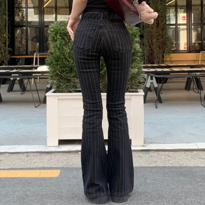 Mote slagjeans for kvinner, med komfortabelt høyt liv og vertikale striper, ideell for fritid og hverdagsbruk.