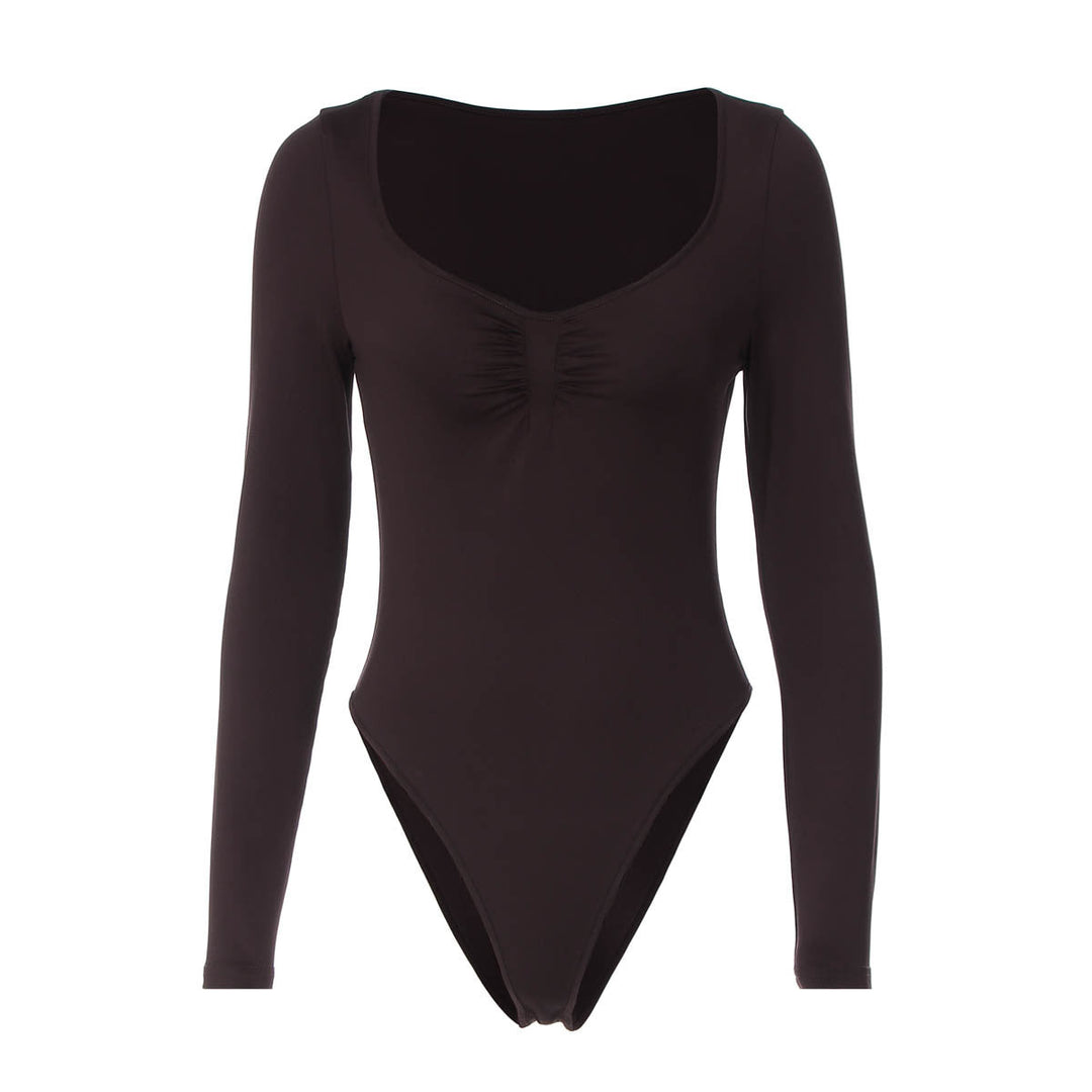 Dame langermet bodysuit med delikat rynkeeffekt i stoffet, skaper et velllykket og trendy antrekk.