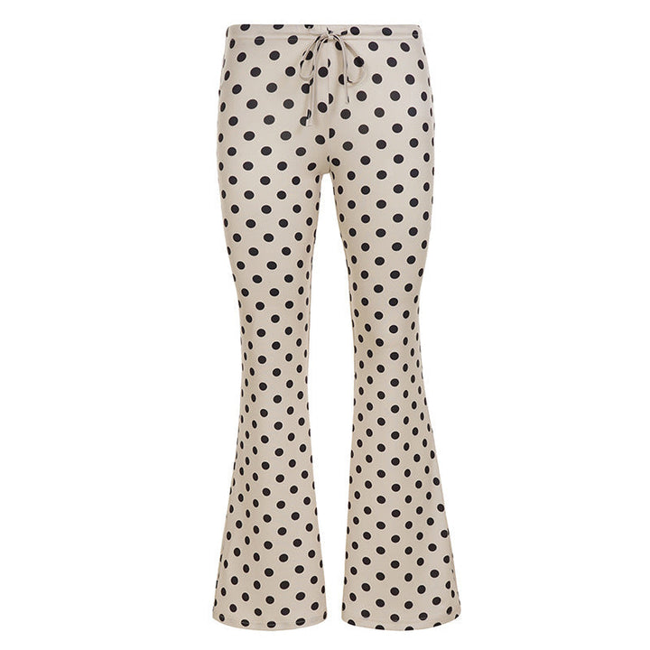 Damebukser i khaki med prikker, vide flared ben og høyt liv. Trendy, komfortable og stilige for enhver anledning.