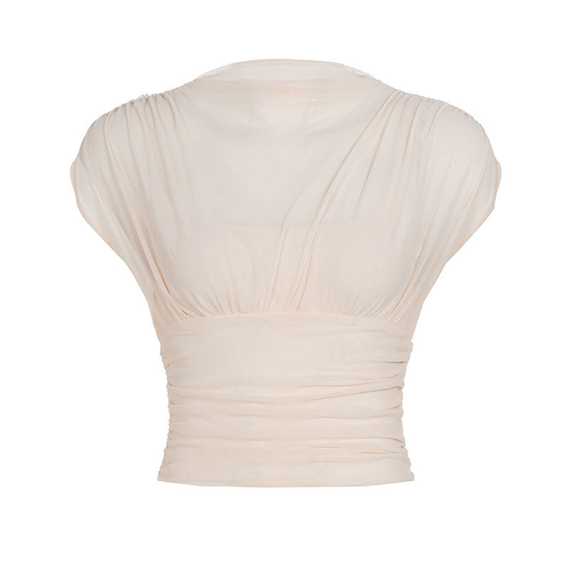 Elegant og chic omslagsbluse for kvinner. Volangdetaljer og komfortabel passform for hverdagsbruk.