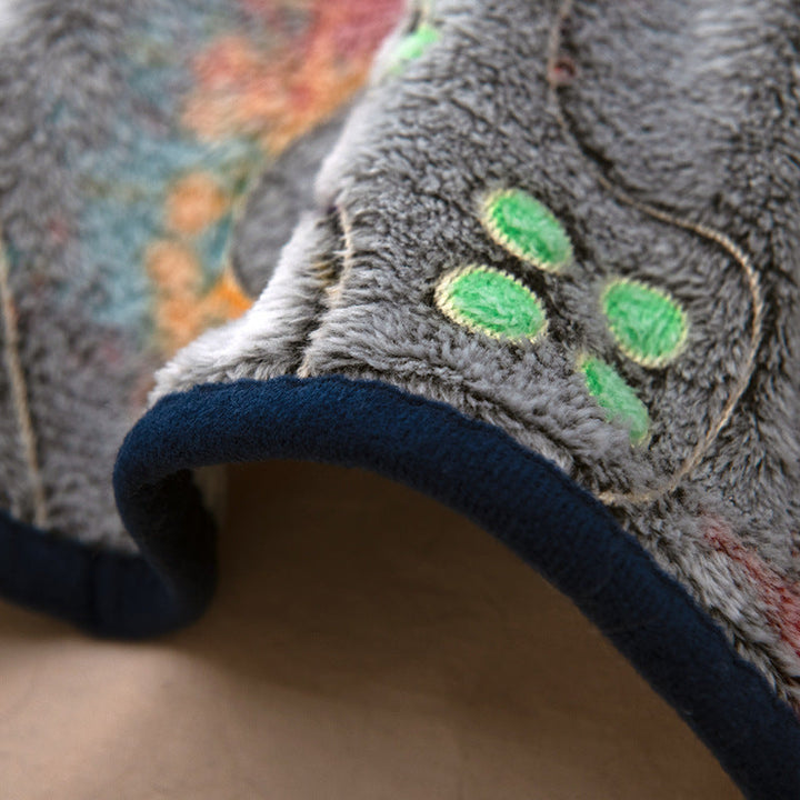 Varmt og mykt kosedekken i fleece med unikt gamingmotiv. Komfortabelt sofateppe for spillere.