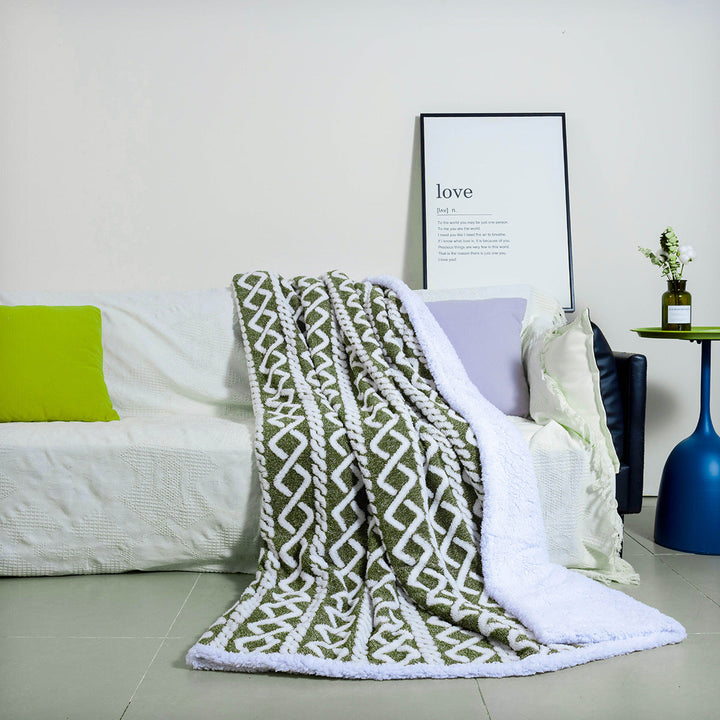 Komfortabelt og mykt boho pledd i nøytrale farger, en ideell gave for hjemmet, gir varme og hygge.
