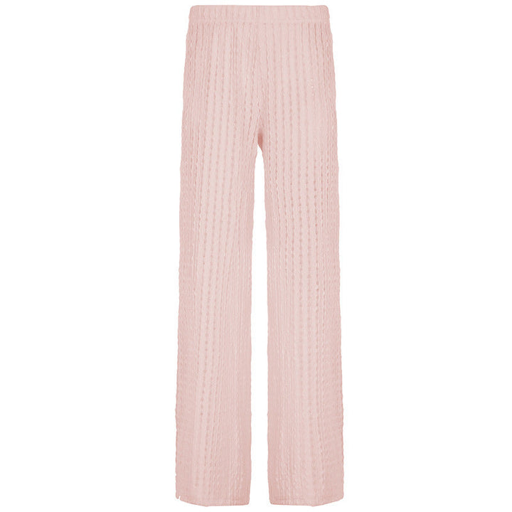 Hvit damebukse med vidde og plissé. Elastisk midje for optimal komfort og en elegant, luftig look.