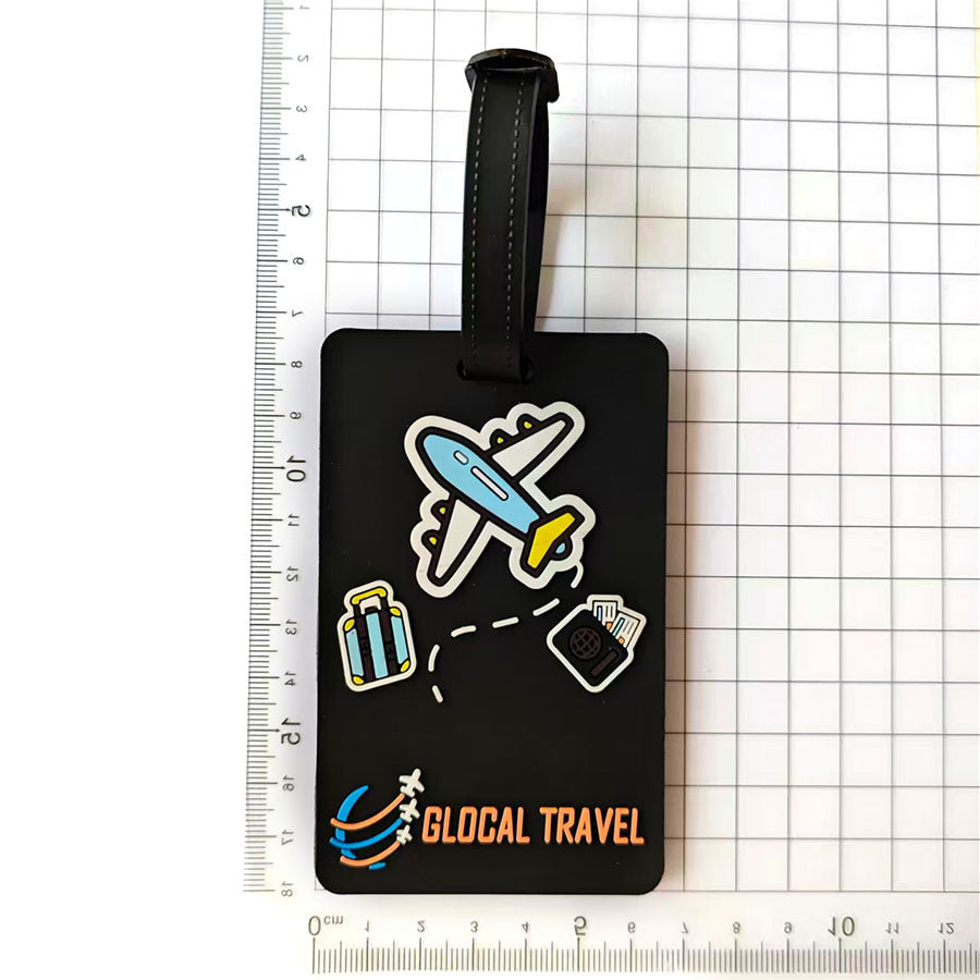 Nærbilde av unisex bagasjelapp i silikon med tydelig flymotiv. Ideelt reiseutstyr for koffertidentifikasjon.