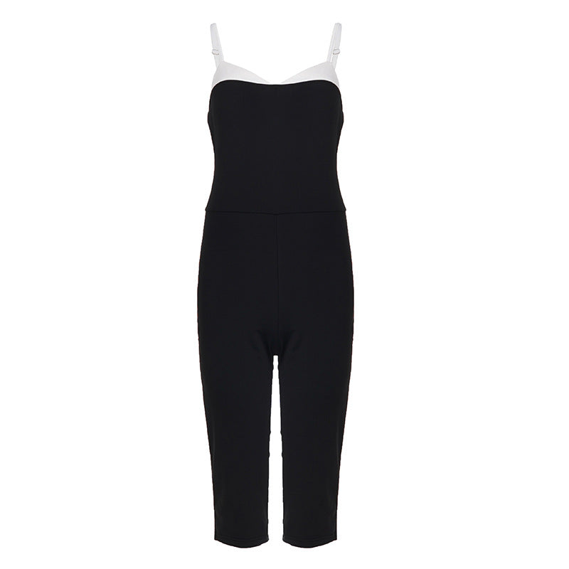 Moderne svart damejumpsuit med justerbare stropper og løs passform. Et must for damemote og ulike anledninger.