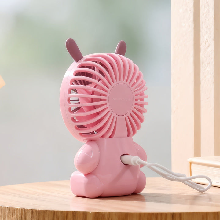 Rosa bærbar mini håndvifte med søtt dyredesign. USB-vifte, perfekt for personlig kjøling på farten.