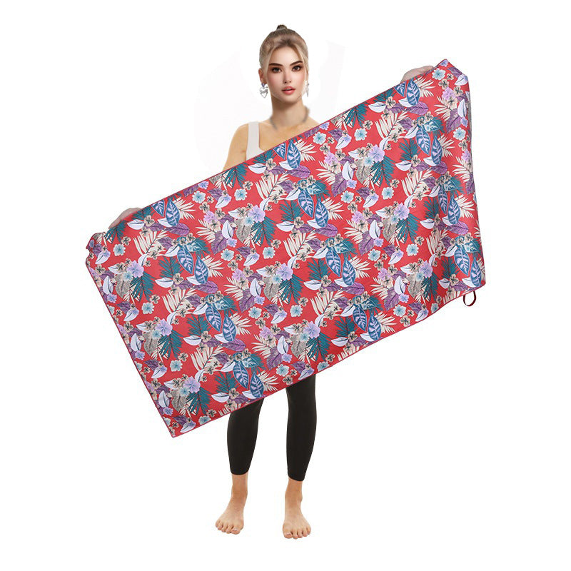Dame strandhåndkle i hurtigtørkende mikrofiber, med et attraktivt fargerikt mønster for sommer.