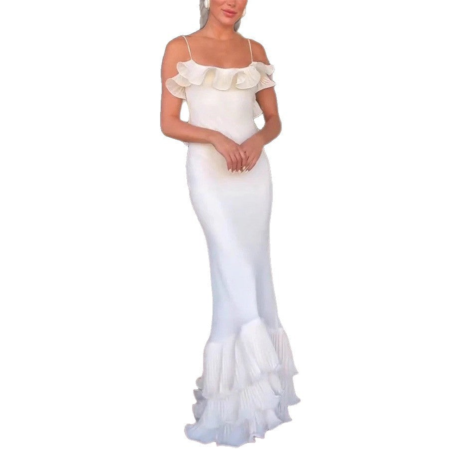 Klassisk aftenkjole for damer, med elegant volang og tidløs stil. Ideell for formelle kveldsantrekk.