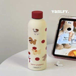 Dame termosflaske 900 ml med lekent hundemotiv i grønt rustfritt stål, ideell for hydrering.