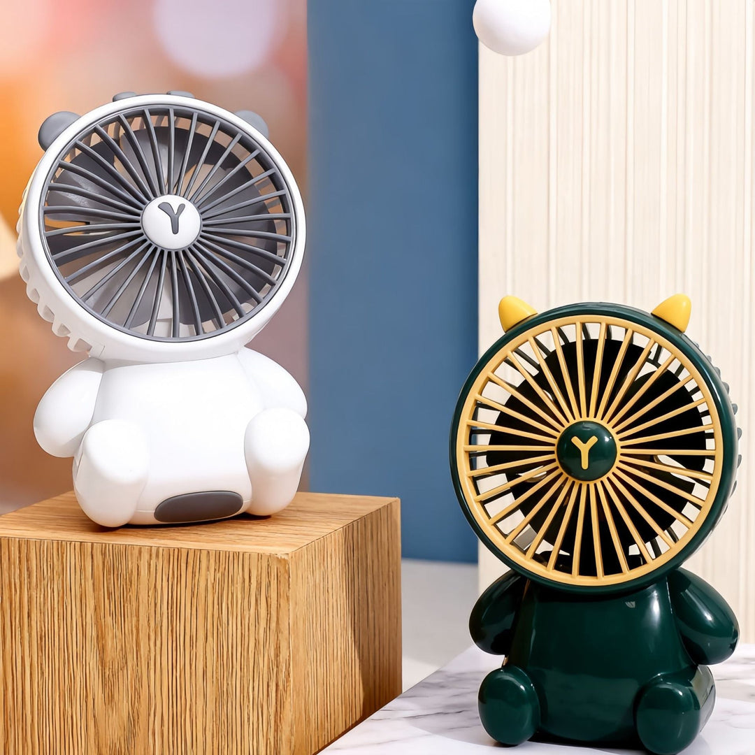 Grønn håndholdt mini vifte med sjarmerende dyredesign. Ideell USB-vifte for sommer, reise og kontor.