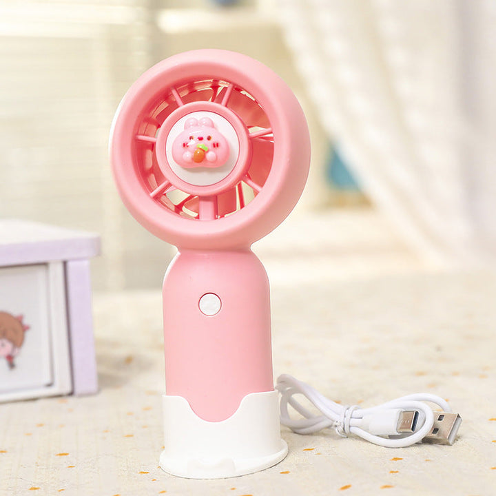 Håndholdt vifte med kawaii dyremotiv. Perfekt kompakt vifte for dame, gir umiddelbar kjølig bris.