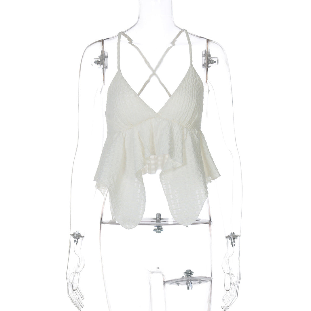Flytende dametopp med volanger og elegante stropper, en chic bluse som kombinerer stil med letthet.