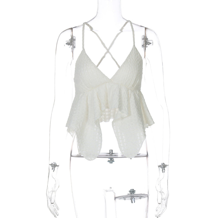 Flytende dametopp med volanger og elegante stropper, en chic bluse som kombinerer stil med letthet.