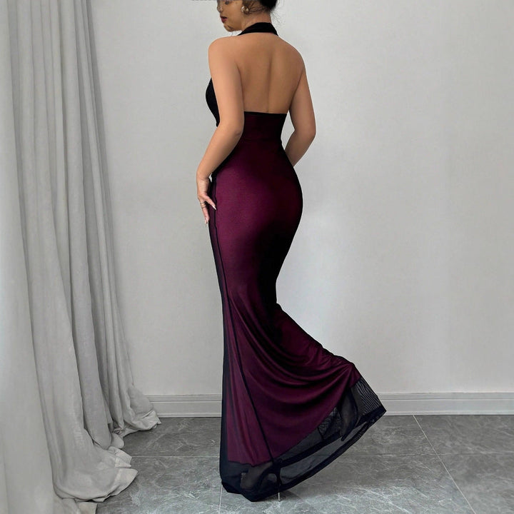 Elegant dame maxikjole med dyp V-hals, en sofistikert lang kjole for spesielle anledninger.