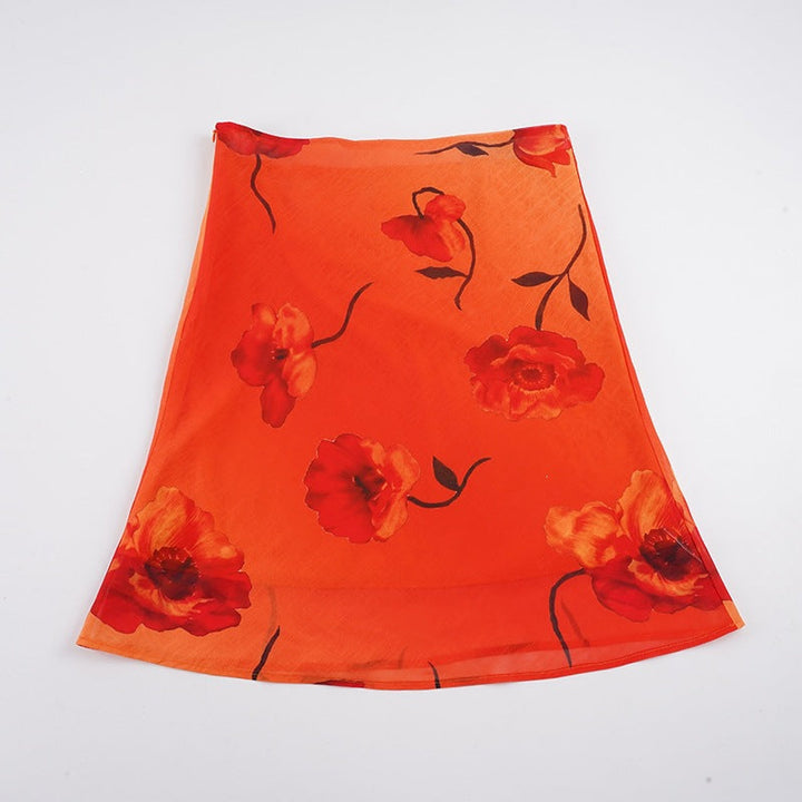 Trendy midiskjørt med blomster for kvinner, perfekt for både fritid og ferieantrekk om sommeren.
