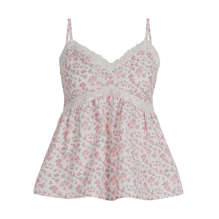 Stilig rosa dame cami-topp med blomsterdesign, lett stoff og løs passform. En elegant og allsidig vårtopp.