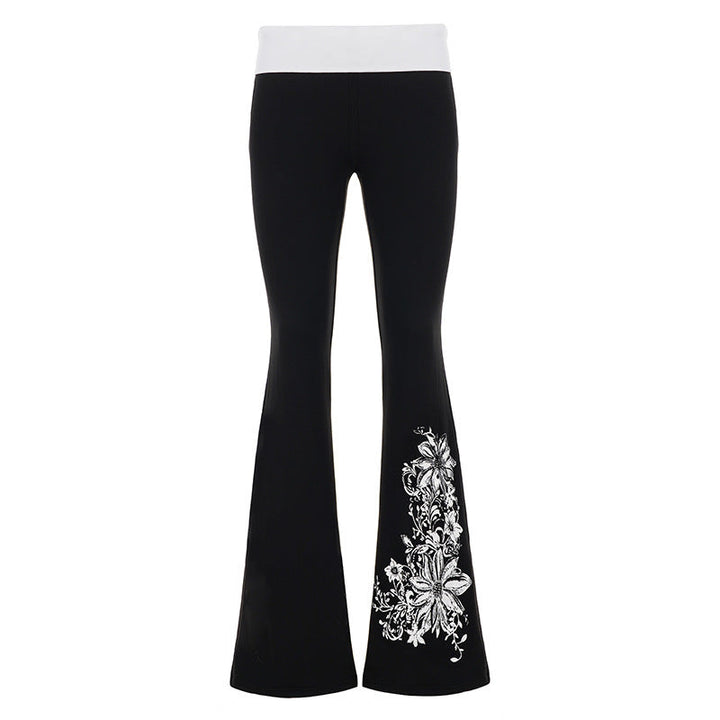 Fasjonable dame yoga-bukser med flared silhuett, høy midje og delikat blomstertrykk for komfortabel fritid.