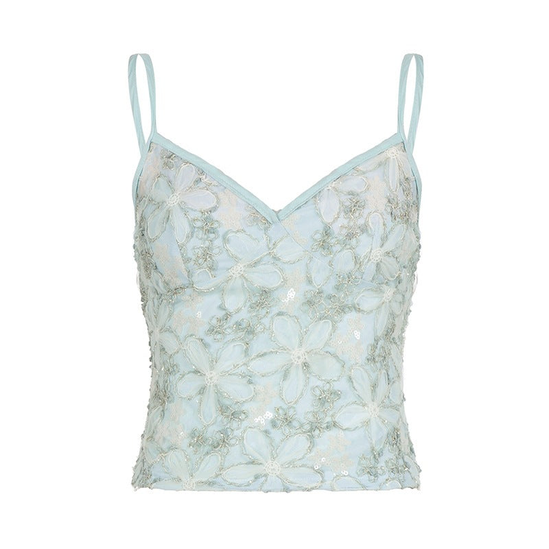 Grønn festtopp for kvinner: blondetopp med blomsterdesign og stilig v-hals, ideell for spesielle anledninger.