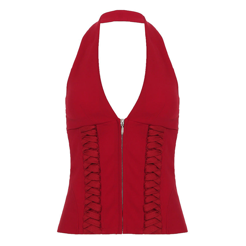 Lett og elegant haltertopp i svart med V-hals og stilige glidelåsdetaljer. En must-have mote dame topp.