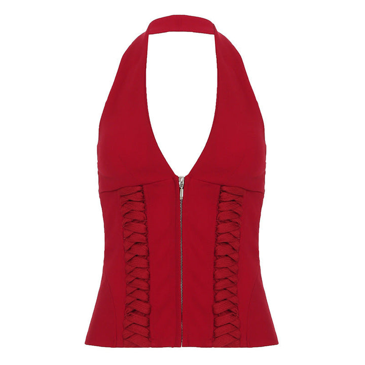 Lett og elegant haltertopp i svart med V-hals og stilige glidelåsdetaljer. En must-have mote dame topp.