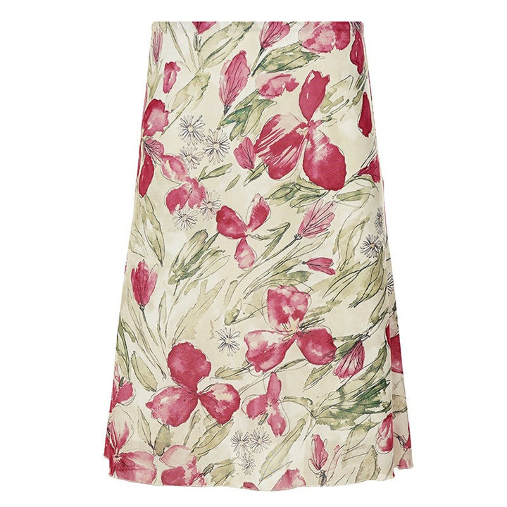 Vakkert dame midiskjørt med svingende blomsterdesign, et must for vårmote og sommerens kvinneklær.