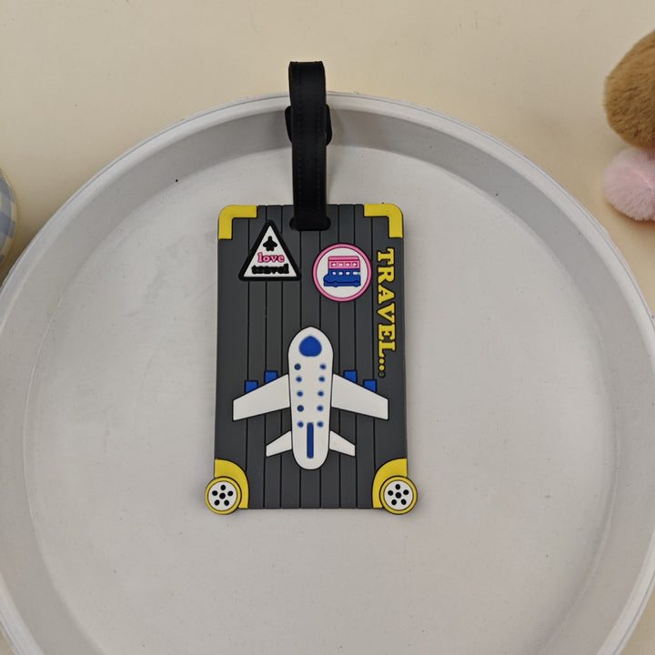 Sikker bagasjetag for koffert, med morsomt og lett gjenkjennelig flydesign.