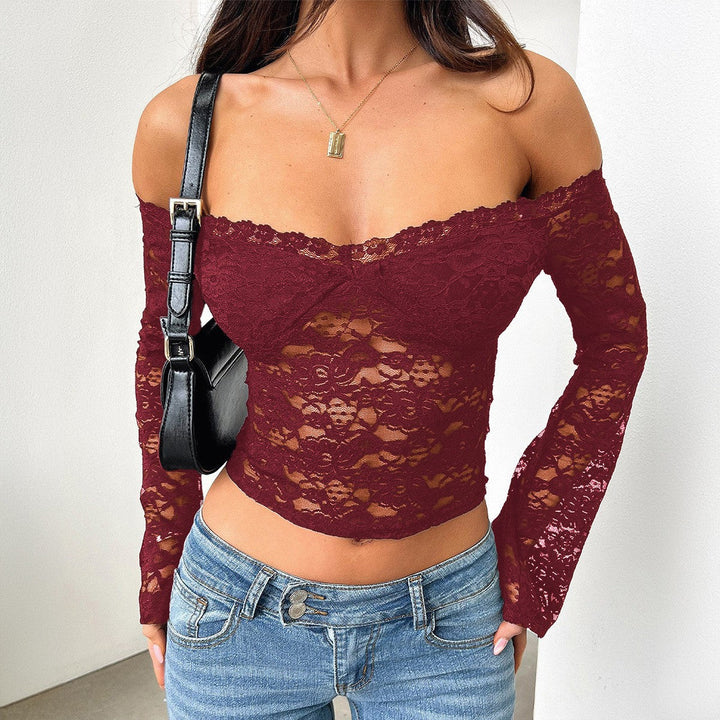 Off-shoulder dametopp med lange ermer, elegant design for en sofistikert look. Perfekt for kvelden.