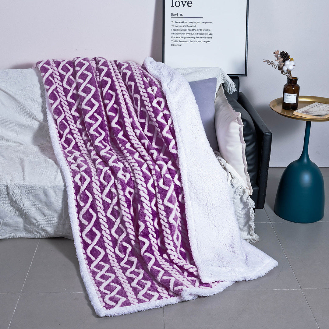 Avslappende mykt pledd med boho-mønster, perfekt for komfortabel hygge i stuen eller som soveromsdekor.