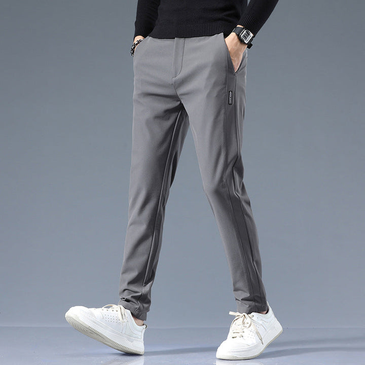 Elegant herre golfbukse med funksjonelle lommer og stretch for en polert golflook.