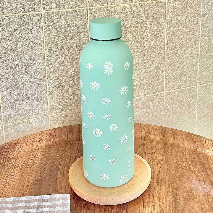 Gjenbrukbar termo drikkeflaske for dame, 500ml, i rustfritt stål med elegant design. Ideell for kontor og reise.