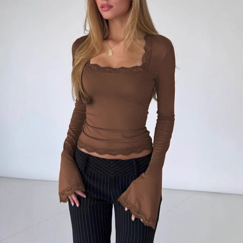 Komfortabel langermet bluse for damer, med feminine blonder for en moteriktig look.